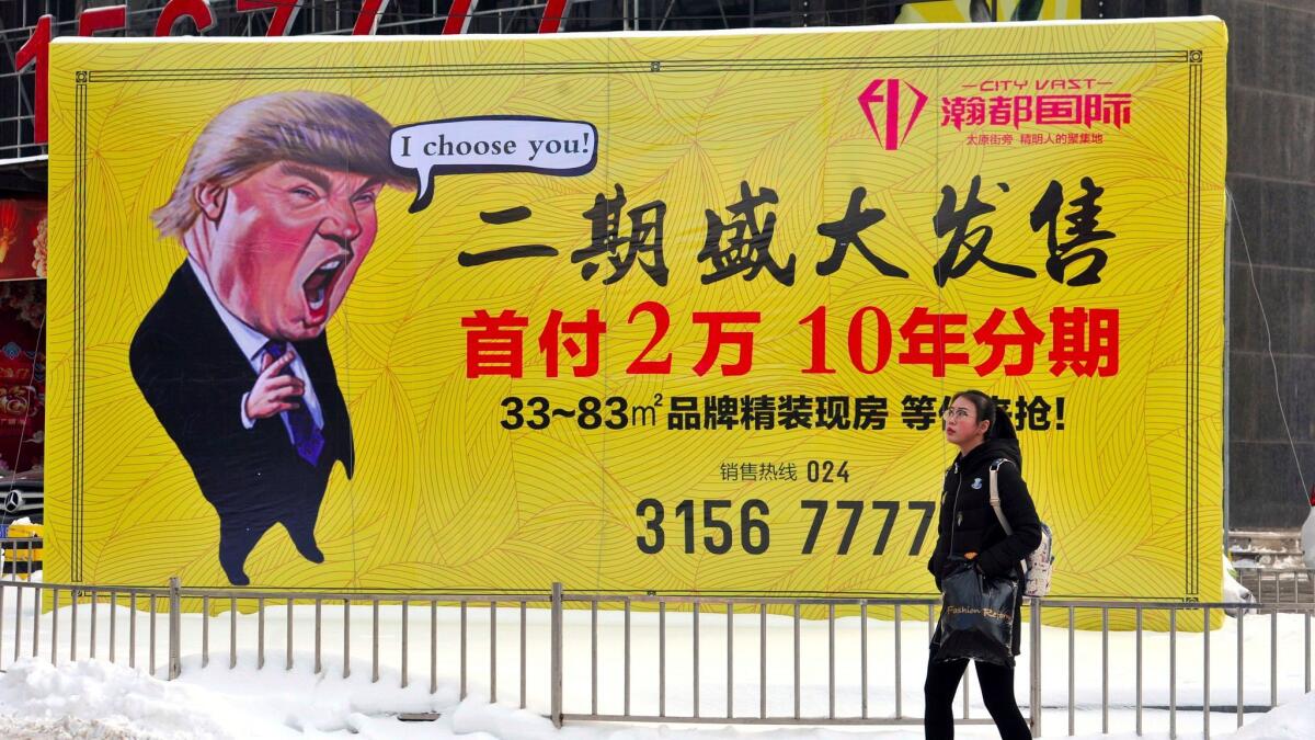 A real estate billboard in Shenyang in northeastern China on Feb. 22, 2017, features a cartoon figure resembling President Trump.