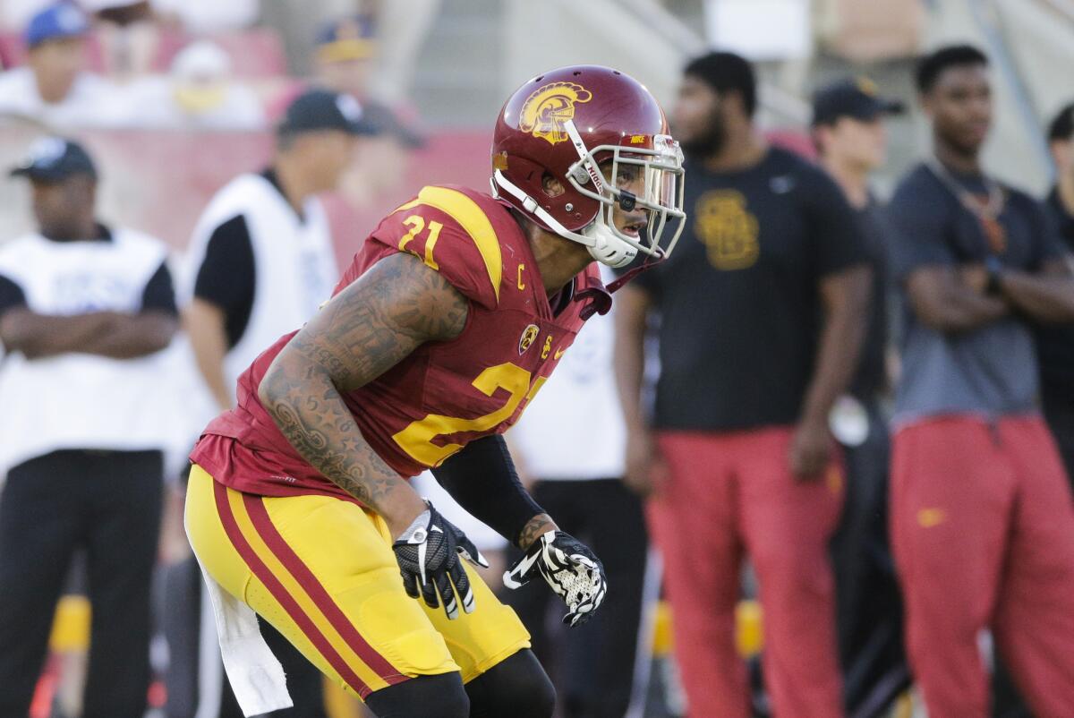 USC linebacker Su'a Cravens warms up before a game against Washington on Oct. 8.