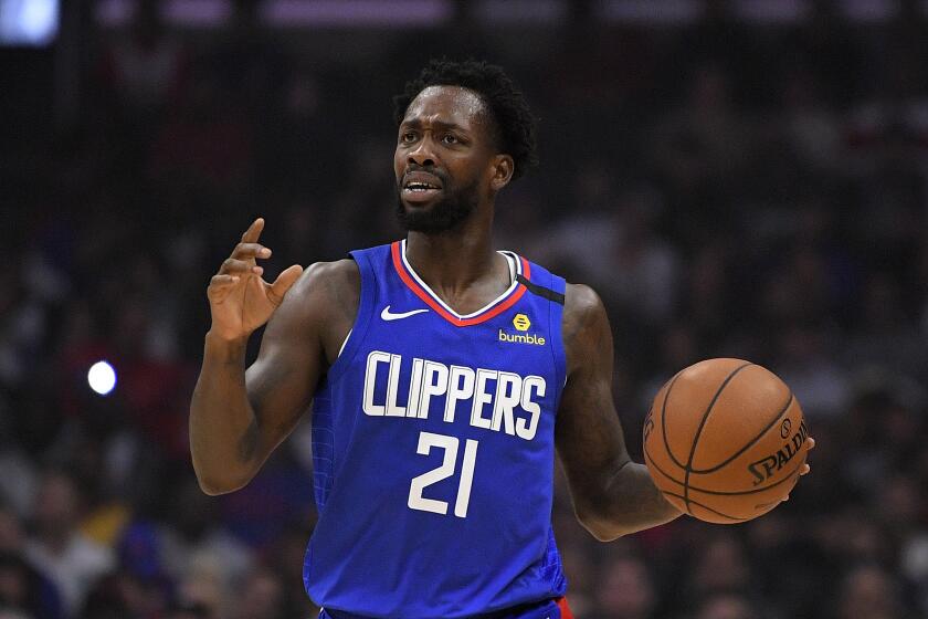 Clippers guard Patrick Beverley gestures during a game against the 76ers on March 1, 2020, in Los Angeles.