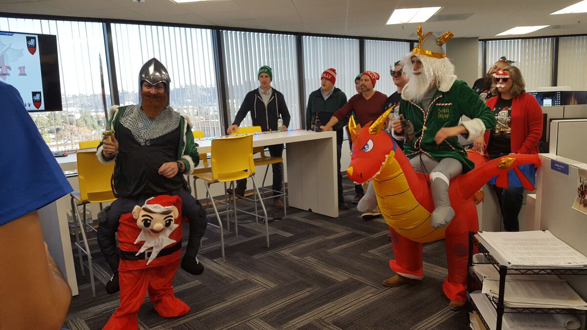 Coffman Engineers employees dressing up for a holiday party.