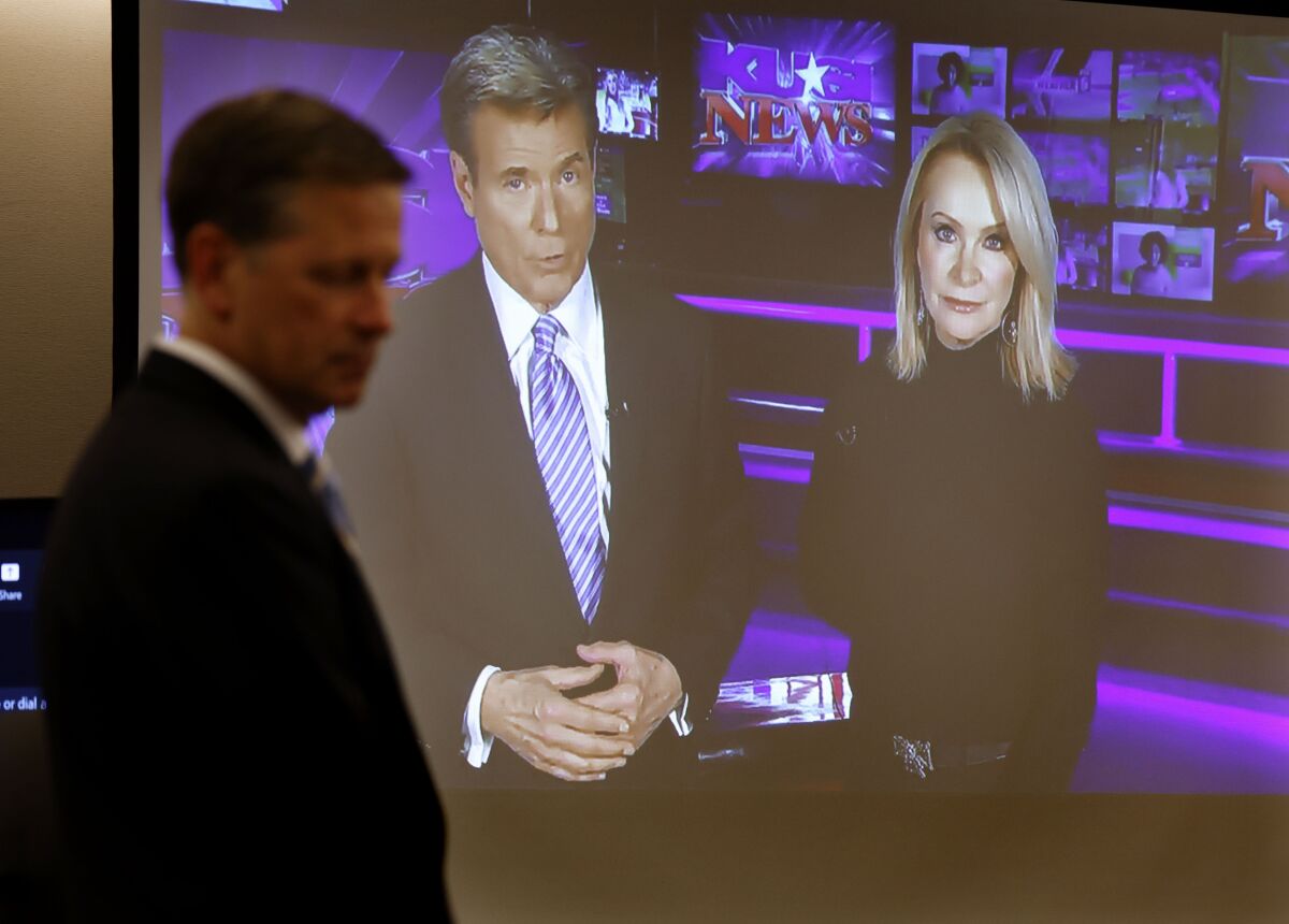 Ken Fitzgerald, attorney KUSI, shows a video of Allen Denton and Sandra Maas in San Diego Superior Court on Feb. 14