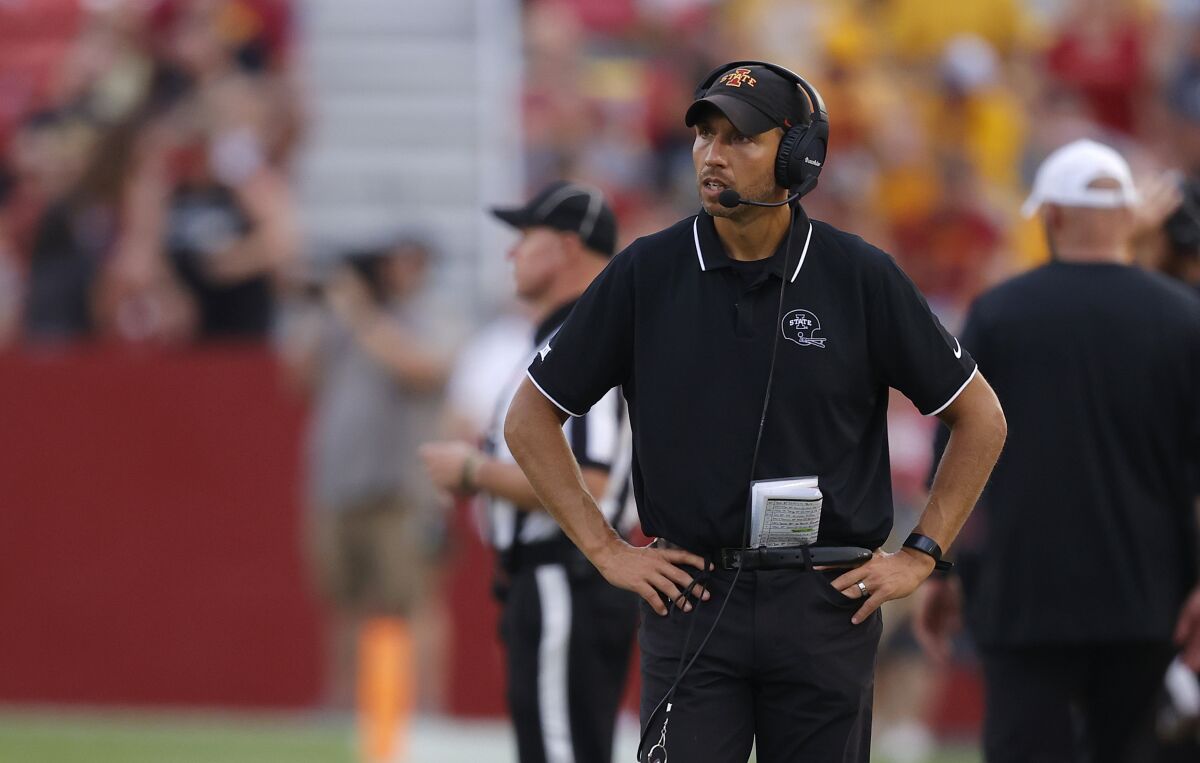 Iowa State coach Matt Campbell walks on the sideline during a game against Iowa on Saturday
