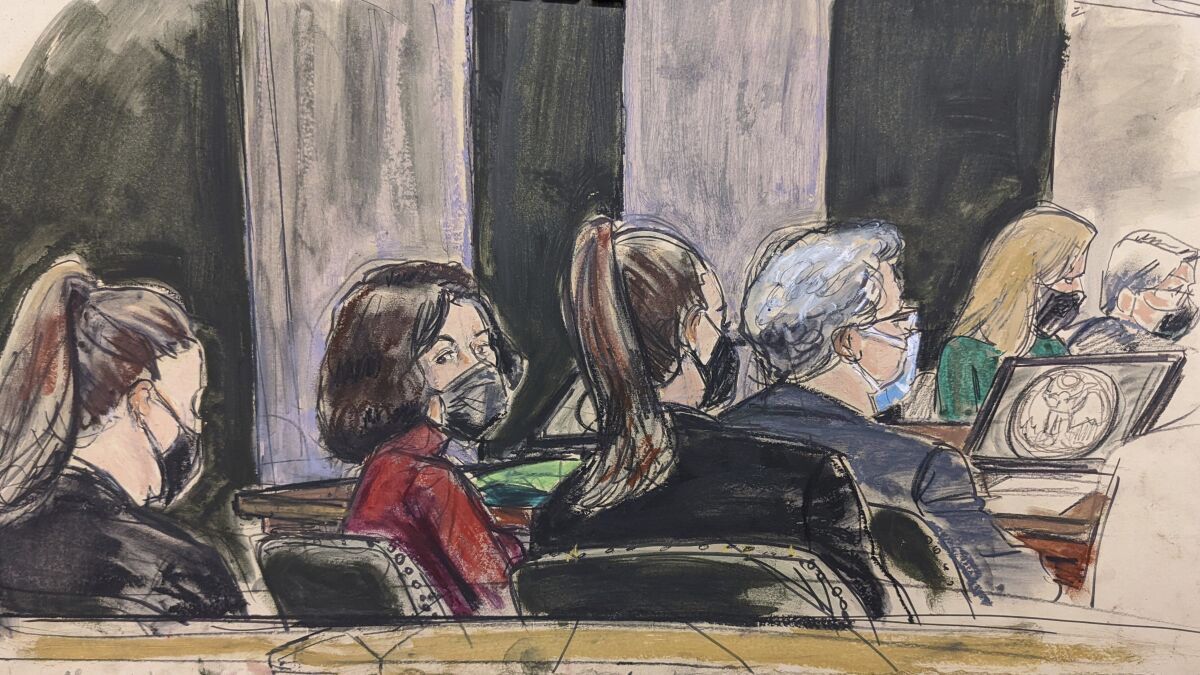 This courtroom sketch shows Ghislaine Maxwell seated at defense table in red sweater, second from left, between two U.S. Marshals next to defense lawyer Jeffrey Pagliuca, third from right, during her sex-abuse trial, Wednesday Dec. 8, 2021, in New York. (Elizabeth Williams via AP)