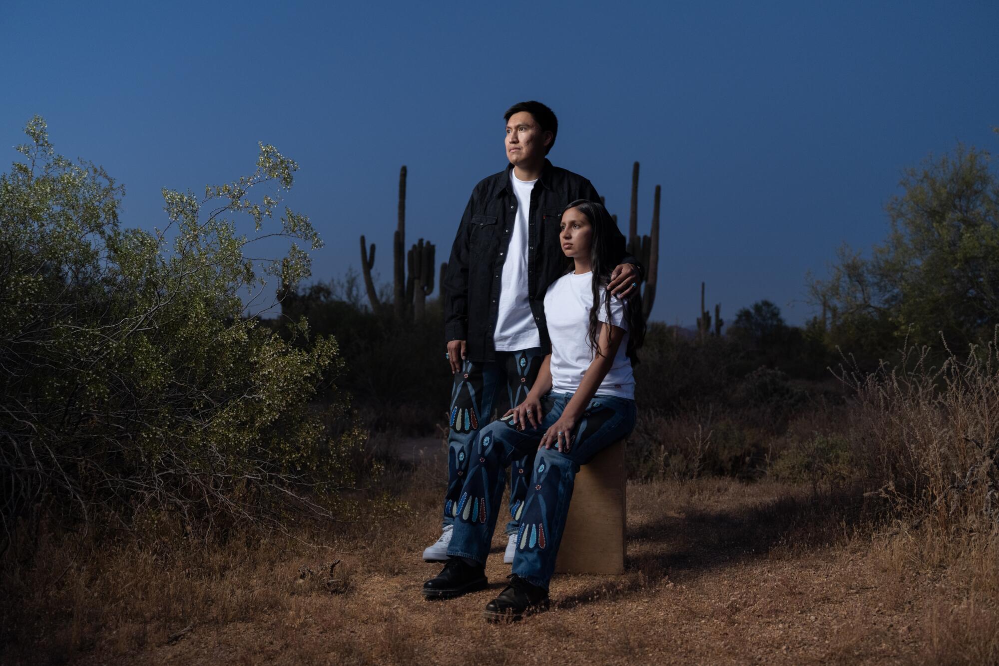 Two people model Born X Raised and Levi's new collection.