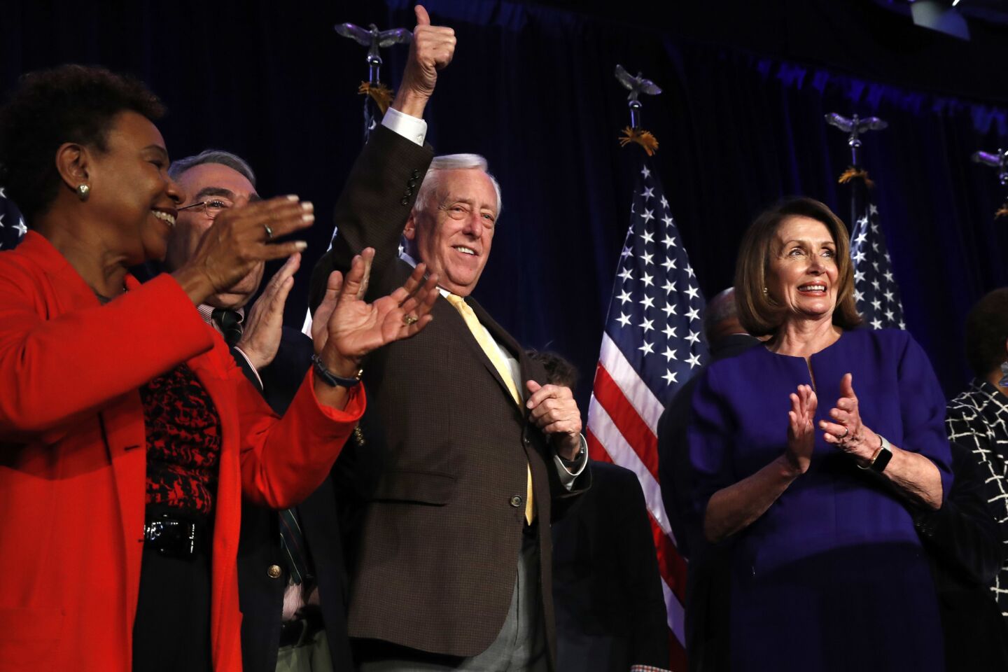 House Minority Leader Nancy Pelosi, right, and Minority Whip Steny H. Hoyer celebrate Tuesday's election result, which puts Pelosi in line to return to the speakership.