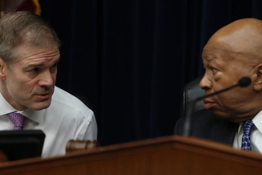 WASHINGTON, DC - MARCH 14: U.S. Rep. Jim Jordan (R-OH) (L) talks with House Oversight and Reform Committee Chairman Elijah Cummings (D-MD) during a hearing on March 14, 2019 in Washington, DC. Commerce Secretary Wilbur Ross testified about the ongoing preparations for the 2020 Census, and with it, the addition of a citizenship question. (Photo by Mark Wilson/Getty Images) ** OUTS - ELSENT, FPG, CM - OUTS * NM, PH, VA if sourced by CT, LA or MoD **