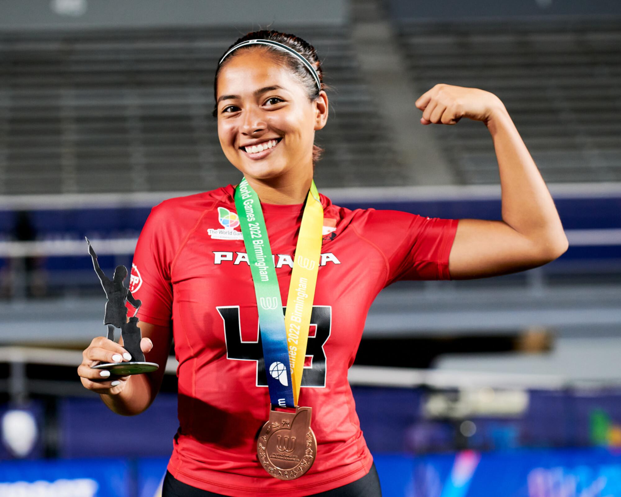 Andrea Castillo celebrates after helping Panama win a bronze medal in flag football at the World Games 2022.