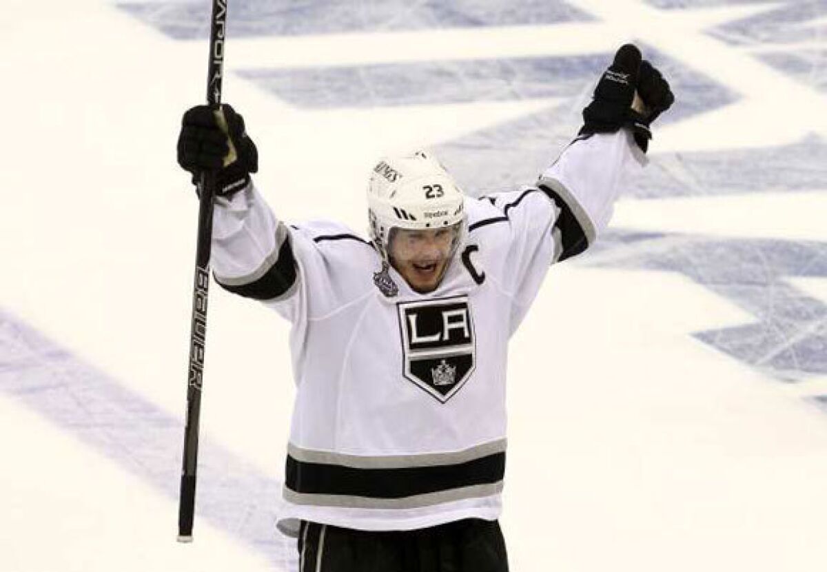 Dustin Brown celebrates after the Kings' Game 2 victory over New Jersey.