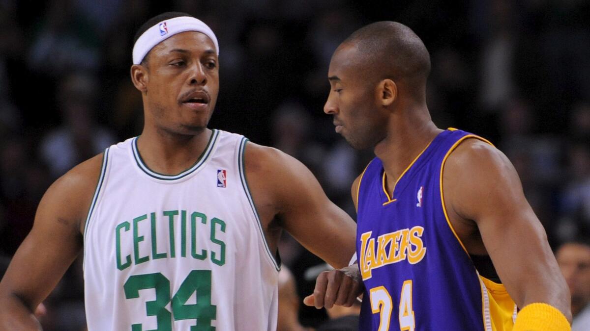 Celtics forward Paul Pierce, left, greets Lakers guard Kobe Bryant chat before a game on Feb. 5, 2009.