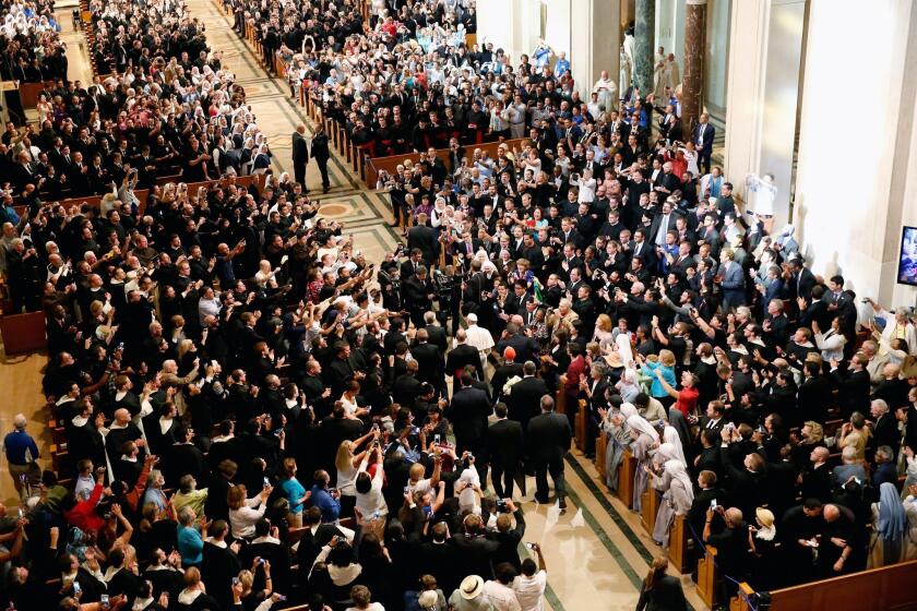 Pope Francis arrives for the canonization Mass for Junipero Serra at the Basilica of the National Shrine of the Immaculate Conception in Washington.