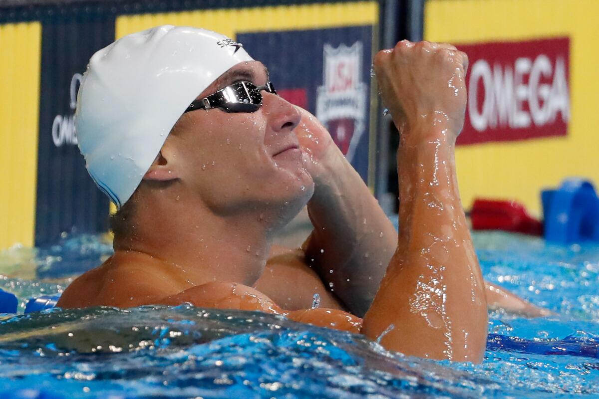 Nathan Adrian celebrates after winning the final heat for the Men's 100 Meter Freestyle of the 2016 U.S. Olympic Team Swimming Trials on June 30, 2016 in Omaha, Neb. 