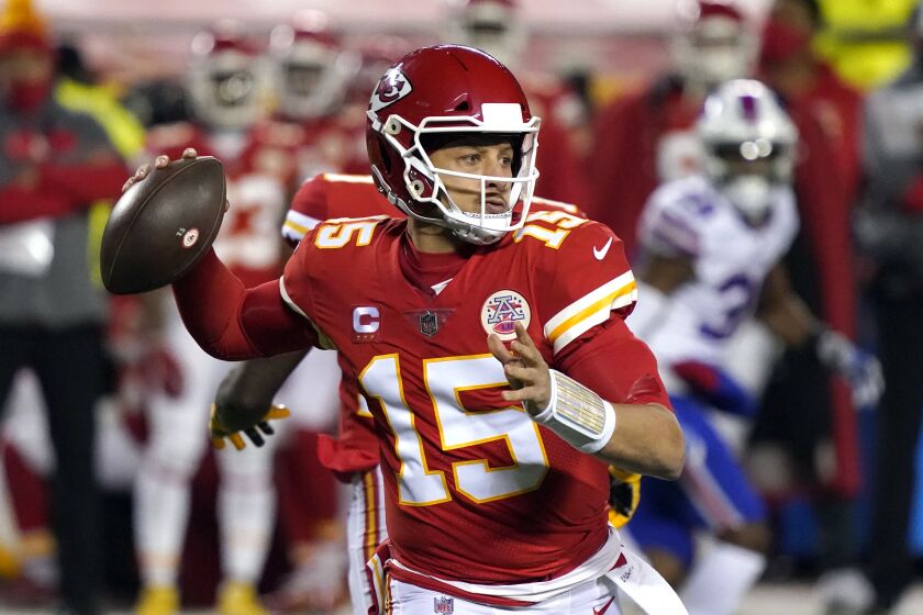Kansas City Chiefs quarterback Patrick Mahomes throws a pass during the first half of the AFC championship.