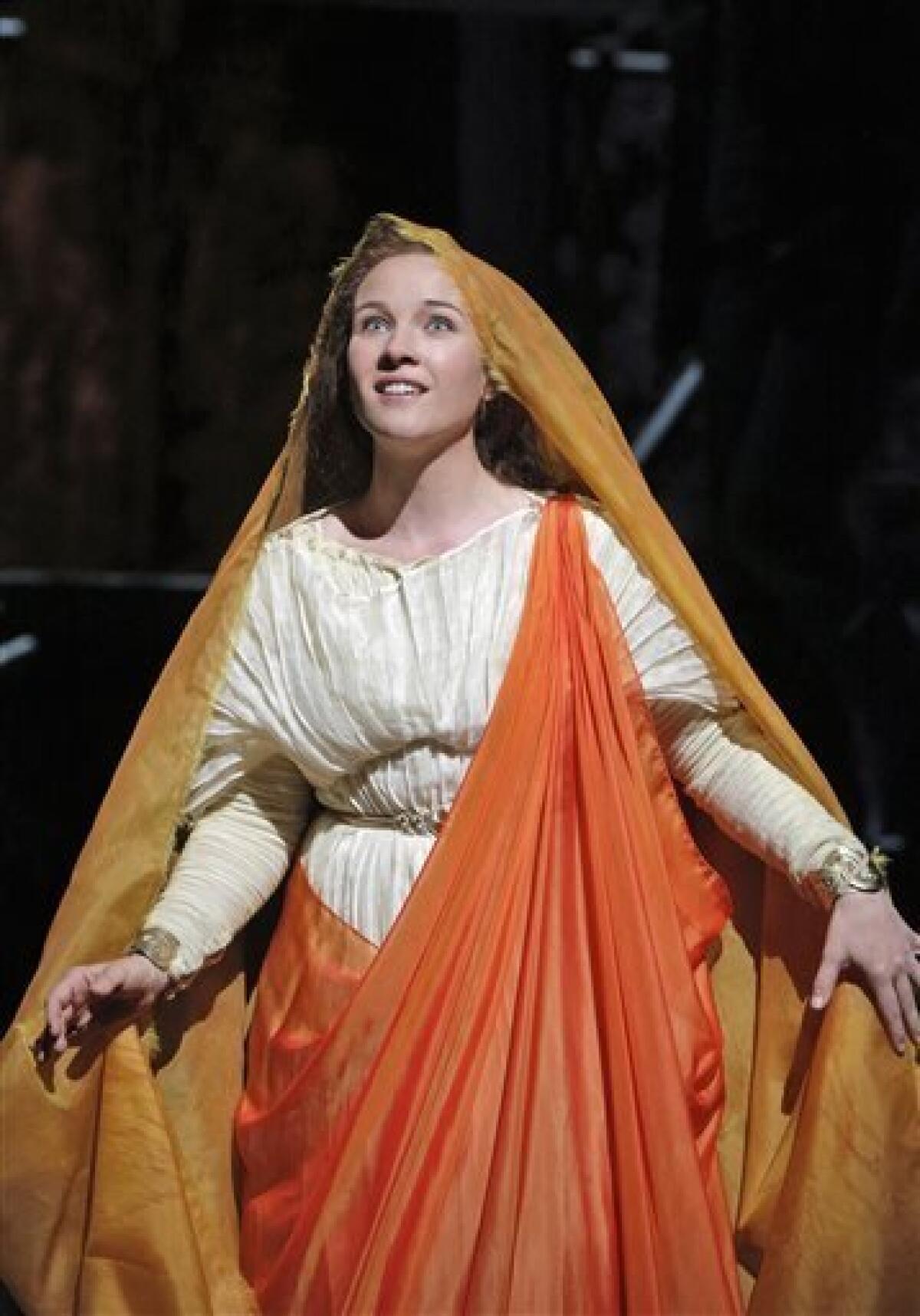 This June 16, 2013 photo released by the San Francisco Opera is Sasha Cooke as Mary Magdalene in the summer opera, The Gospel of Mary Magdalene, in San Francisco. (AP Photo/San Francisco Opera, Cory Weaver)