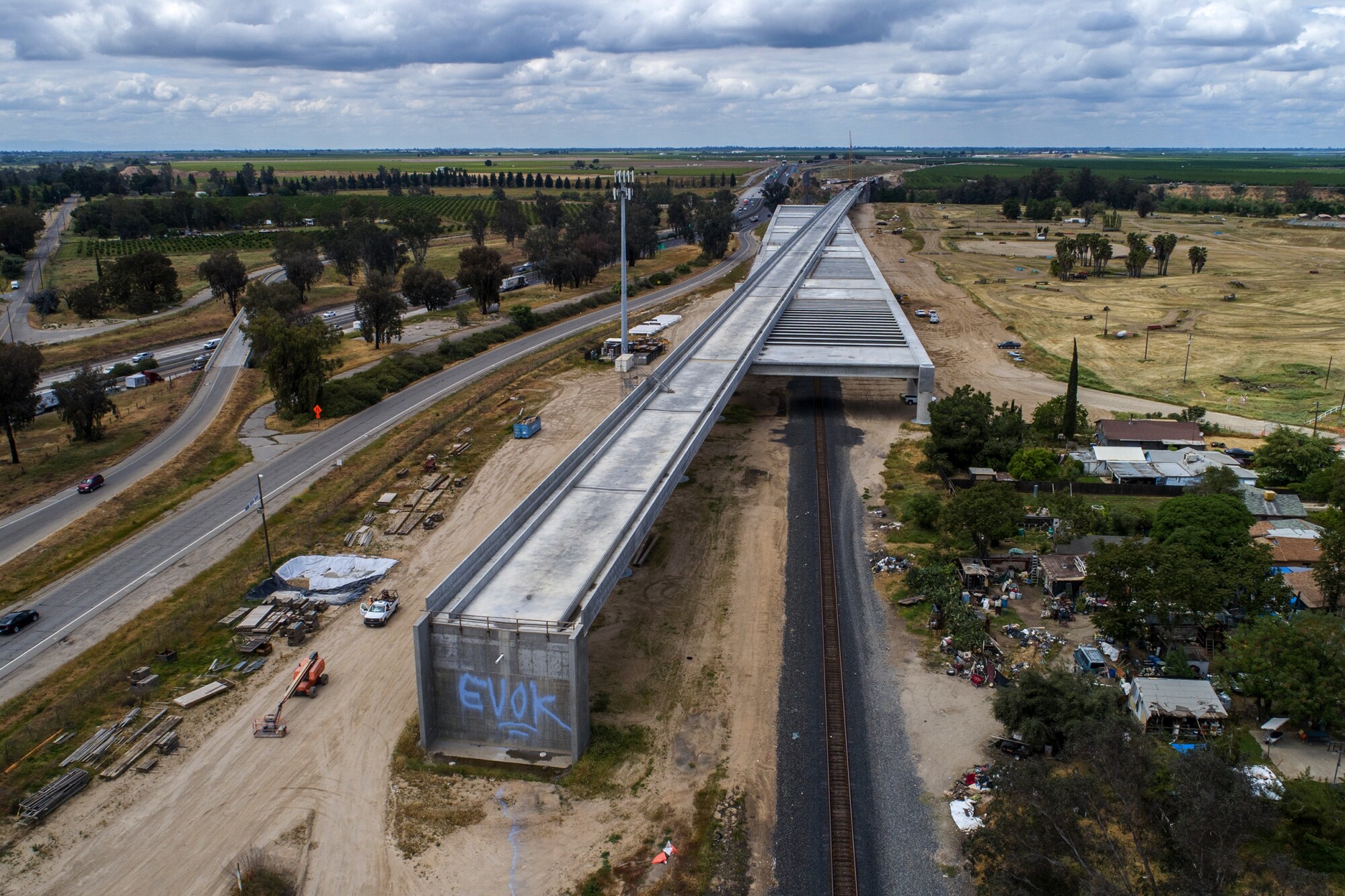Aerial view of construction site at a viaduct near a rural road