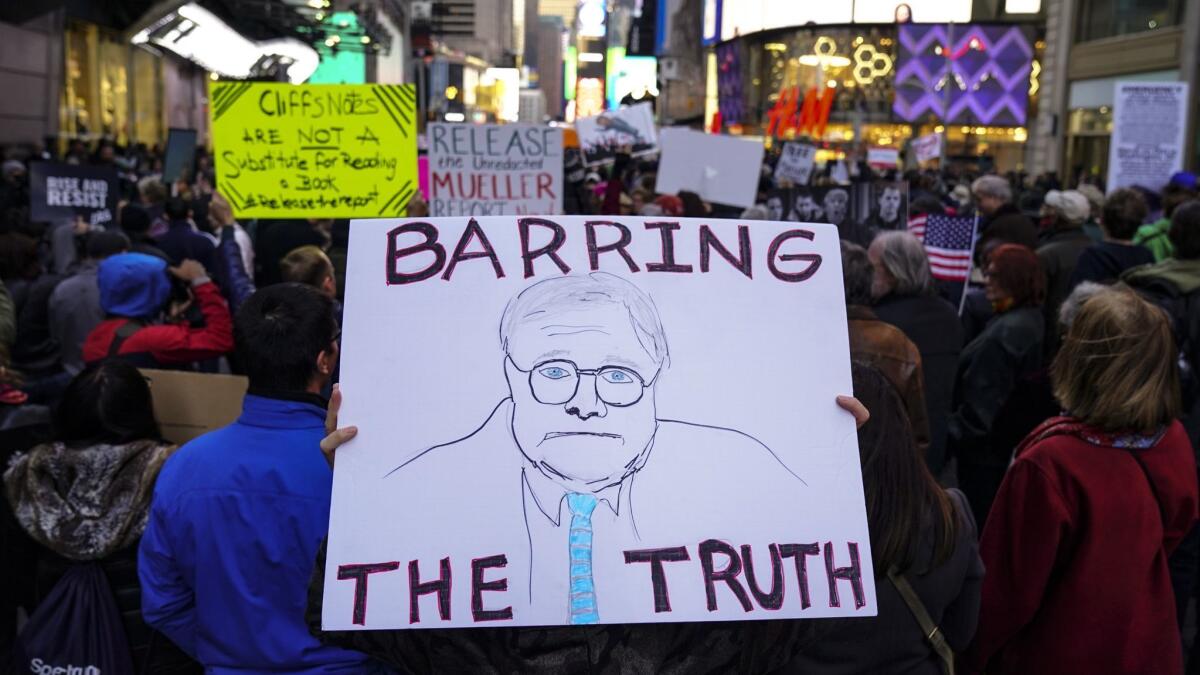 Protesters gather in Times Square on April 4 to call for the full release of Robert Mueller's report.