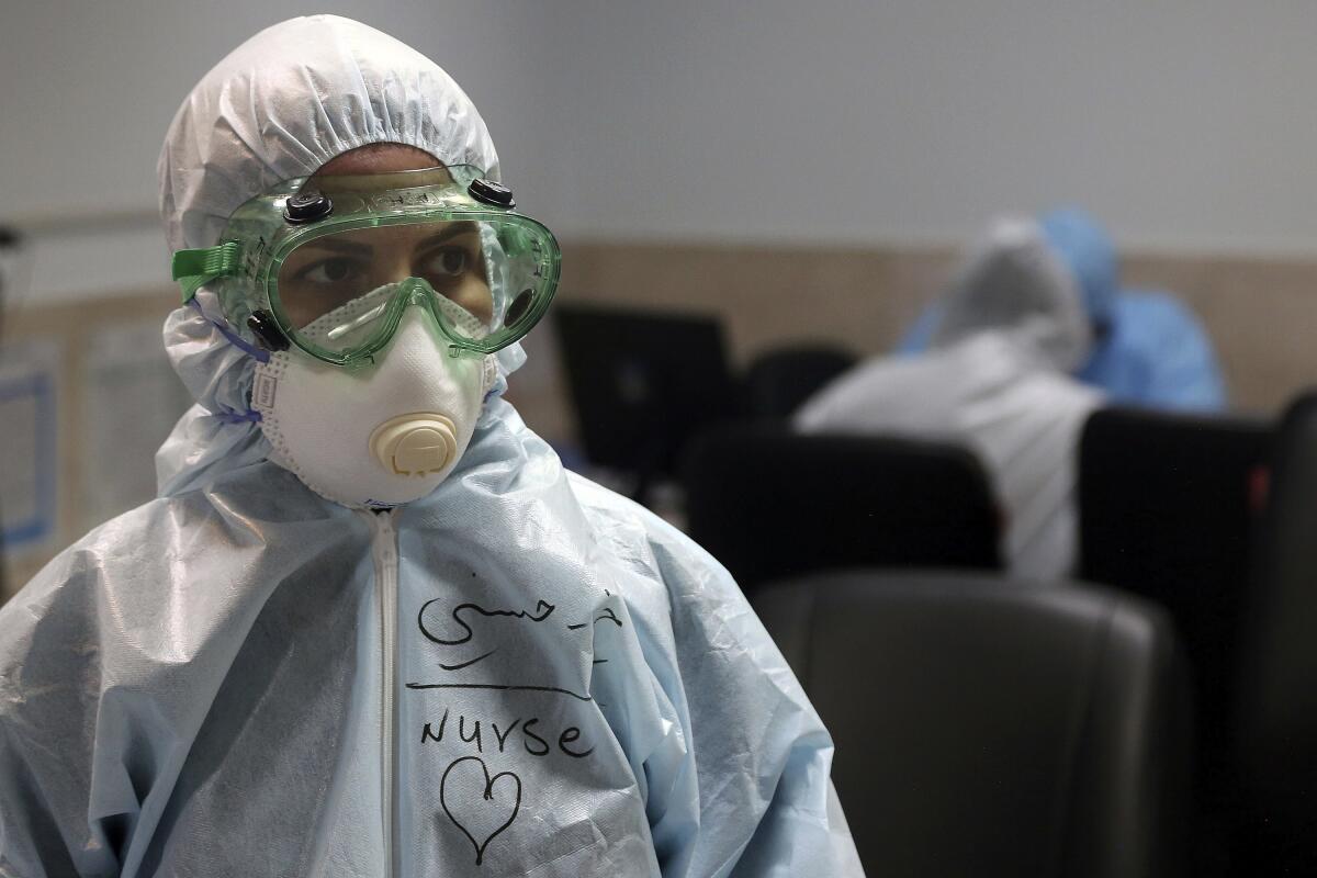 A nurse in protective gear in Iran