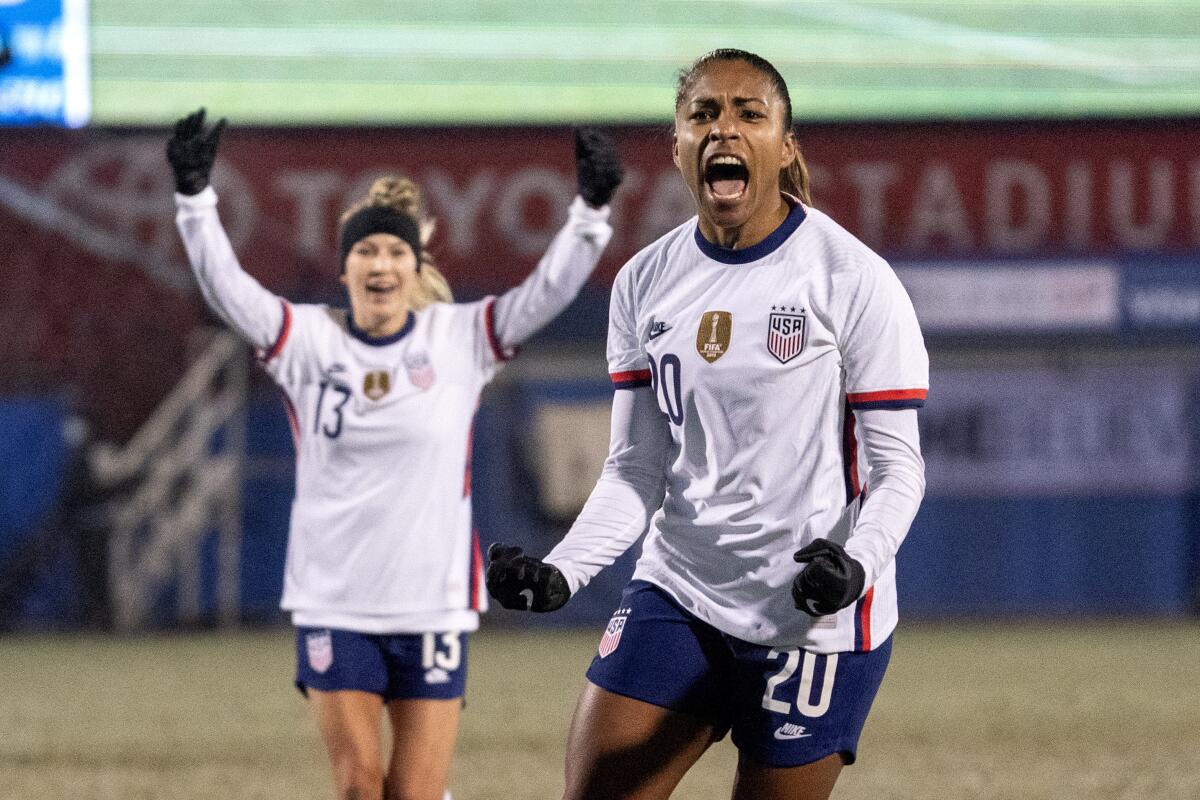 U.S. forward Catarina Macario and midfielder Ashley Sanchez celebrate Macario's goal.