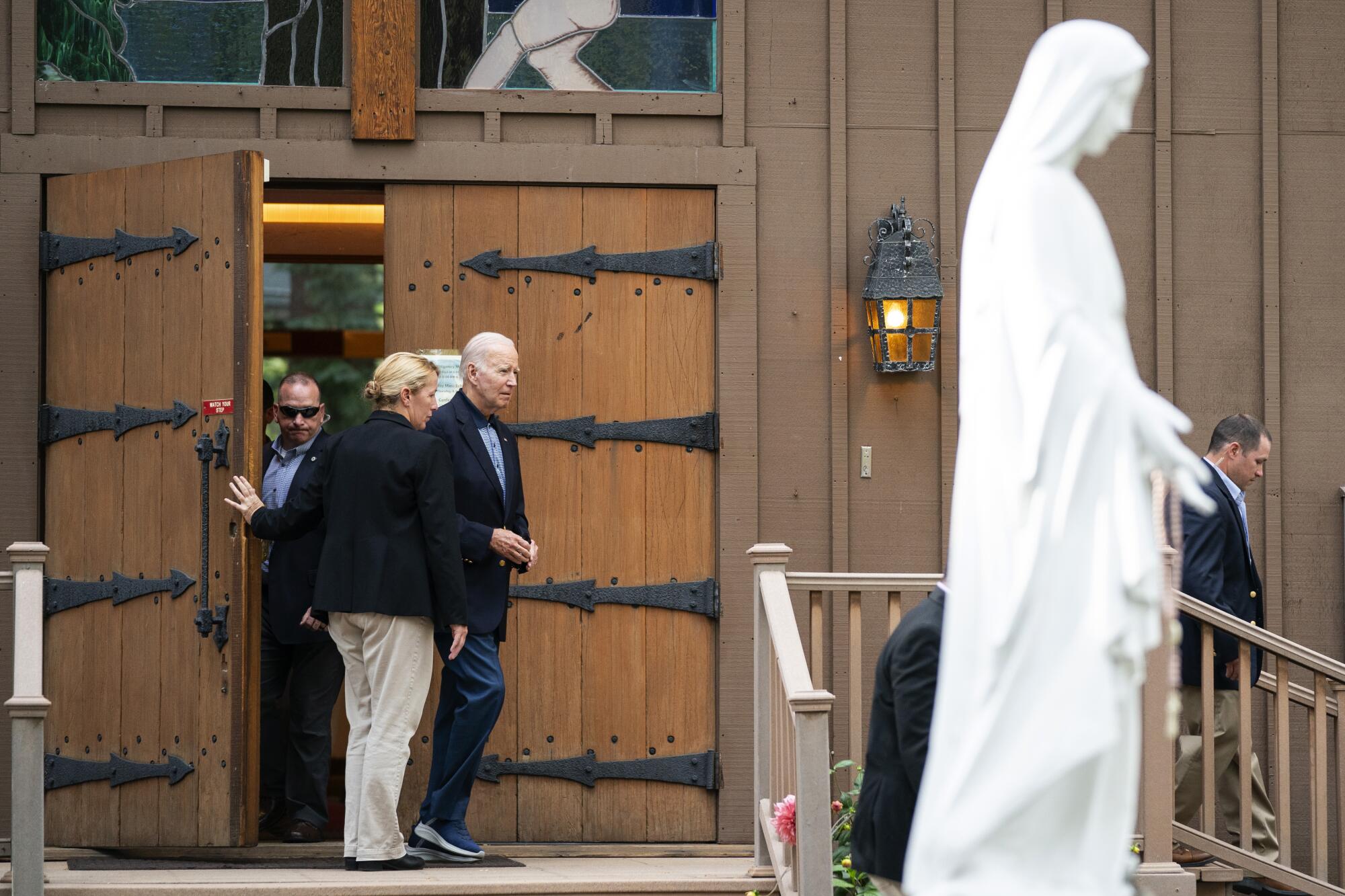 President Joe Biden leaves Our Lady of Tahoe Catholic Church after attending Mass.