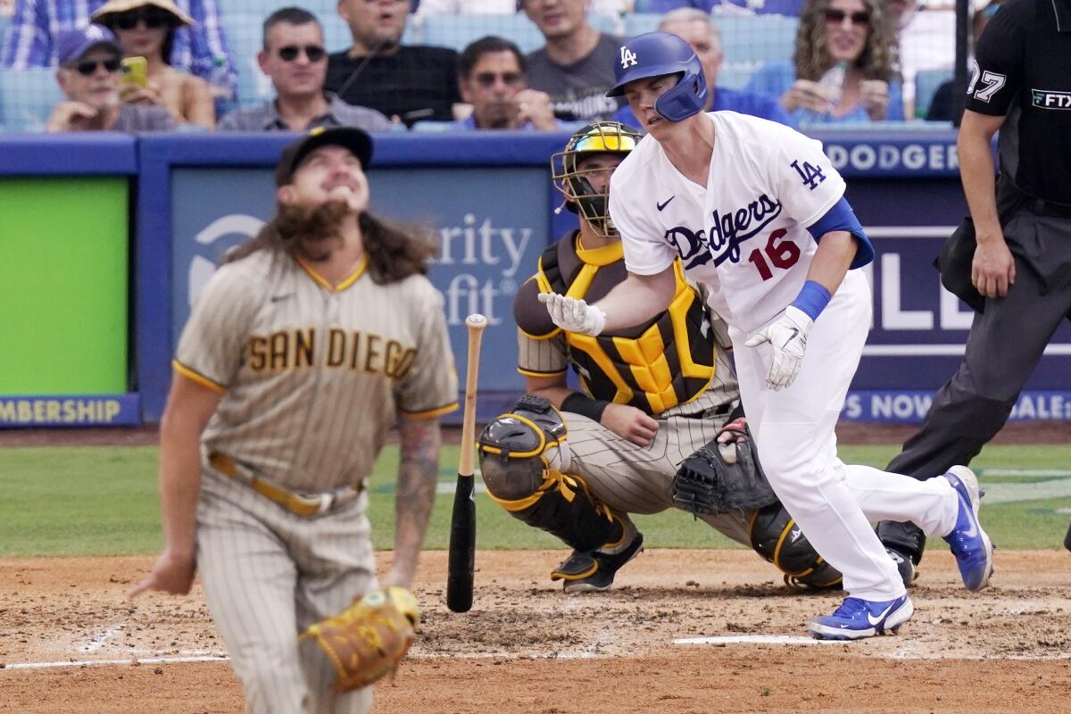 Padres pitcher Mike Clevinger watches a home run by the Dodgers' Will Smith fly in the fourth inning of Sunday's game.