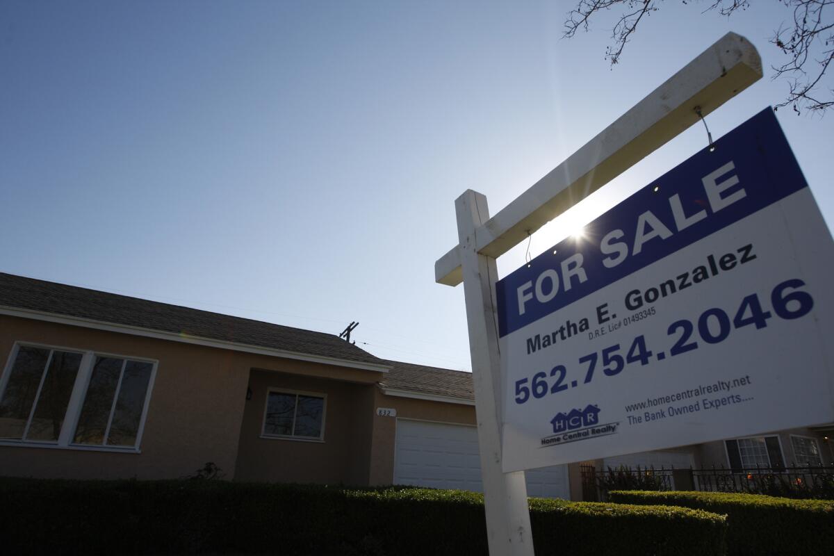 A home for sale in Compton in 2013. Falling foreclosure rates have helped boost home values across much of Southern California in the last year.