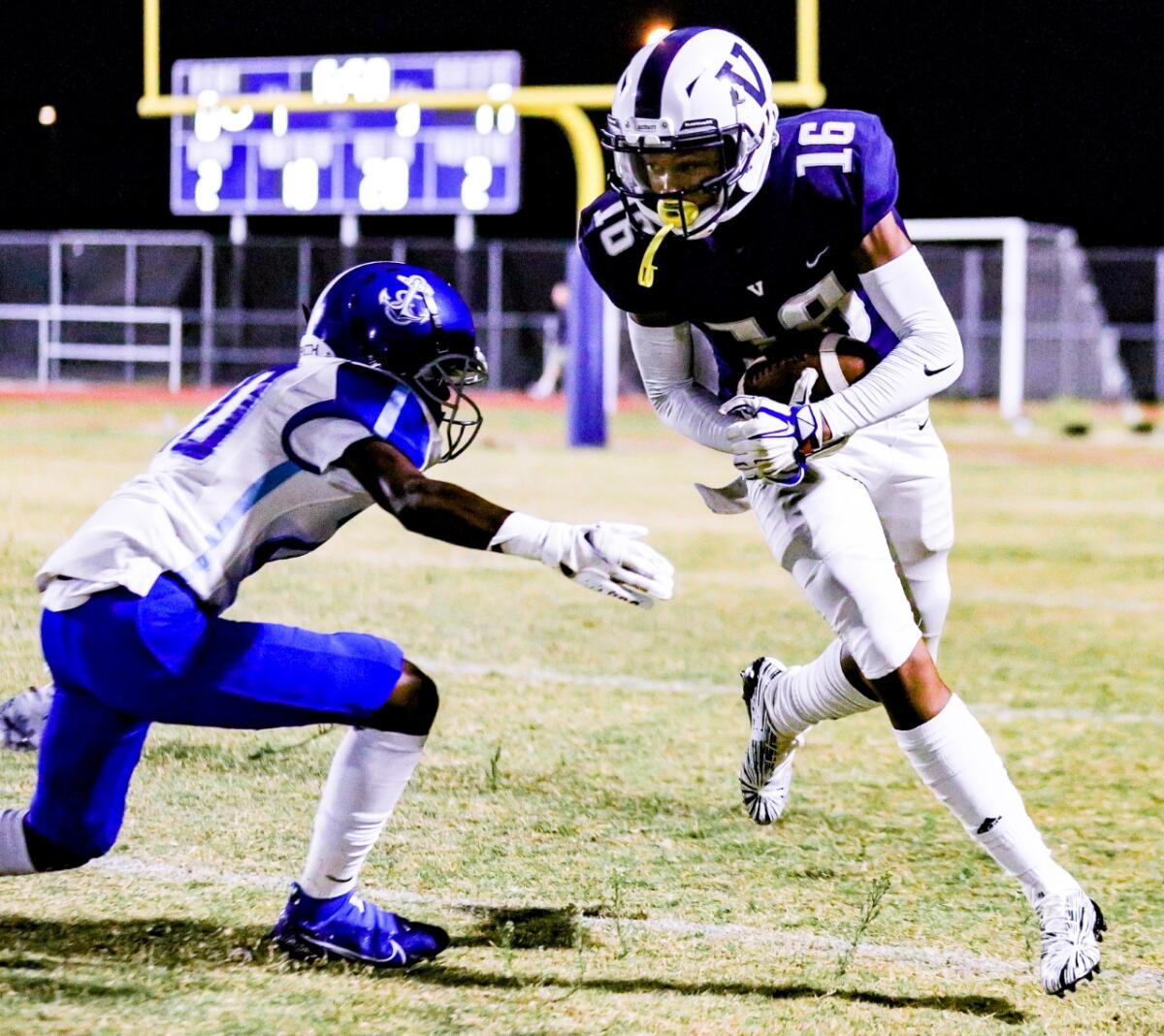 Venice's Joshua Coats tries to evade a Palisades defender.