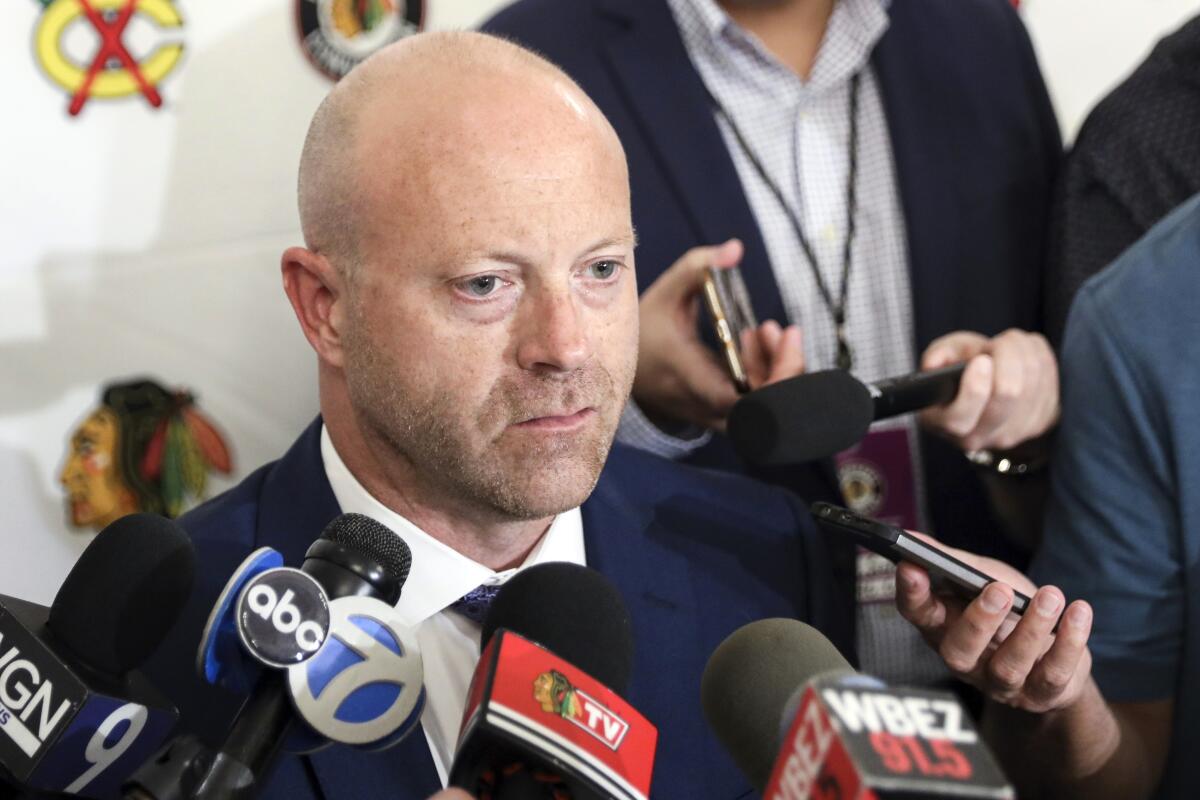 Chicago Blackhawks senior vice president and general manager Stan Bowman speaks to reporters i 2019.
