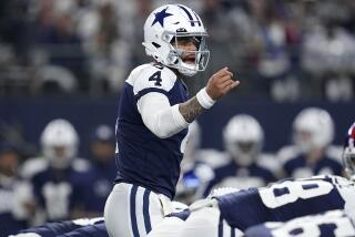 Dallas Cowboys quarterback Dak Prescott signals at the line of scrimmage during an NFL football game against the New York Giants Thursday, Nov. 24, 2022, in Arlington, Texas. (AP Photo/Tony Gutierrez)