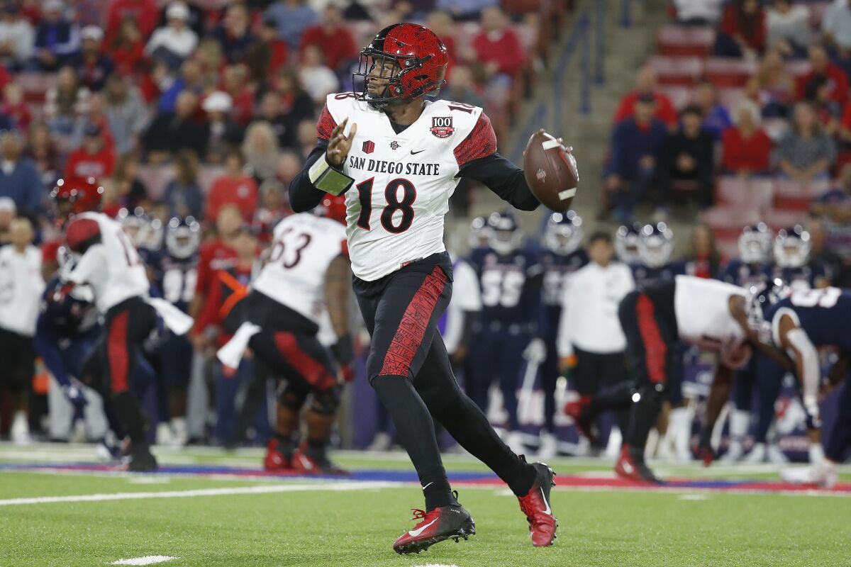 San Diego State quarterback Jalen Mayden takes a shot downfield during first half against Fresno State.