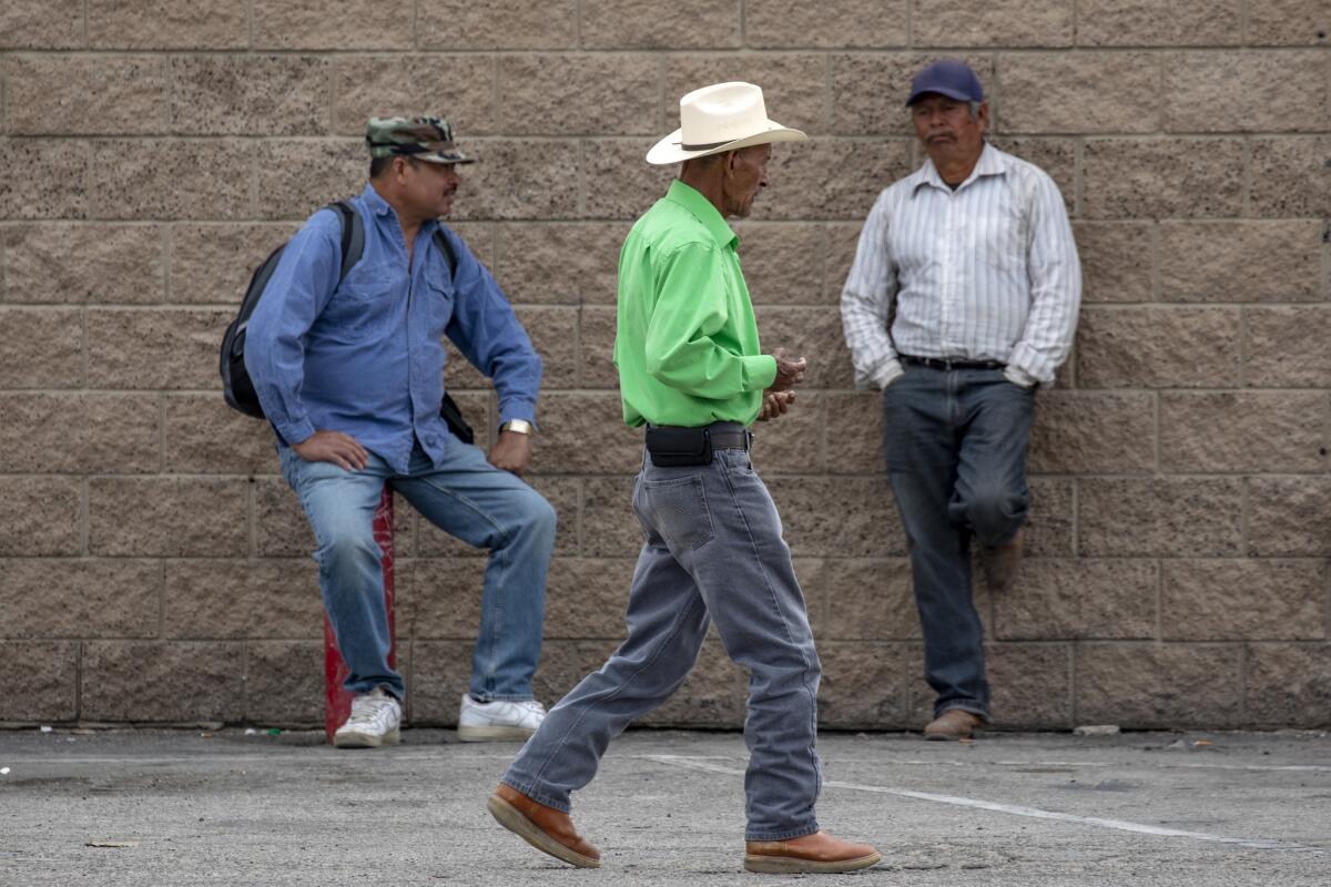 Farmworkers are caught in the middle of the shelter closing. (Irfan Khan / Los Angeles Times)