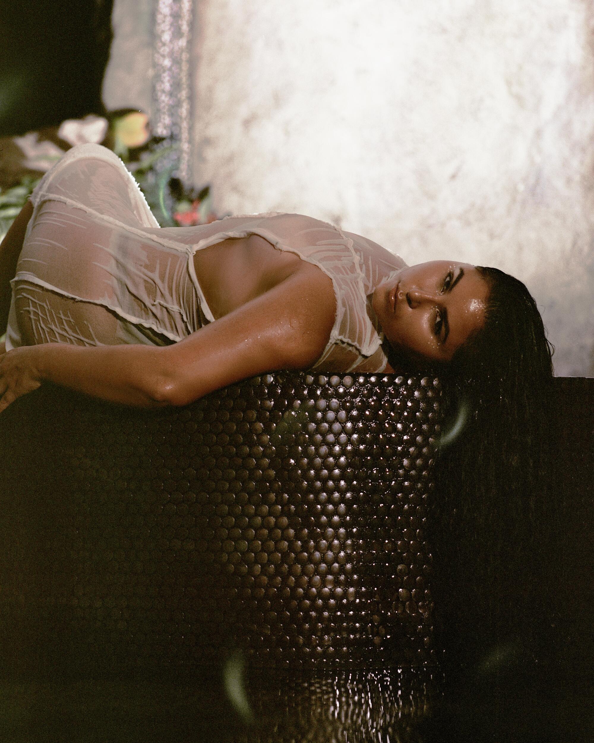 Cecilia wears Comme des Garçons dress from the Ruby.