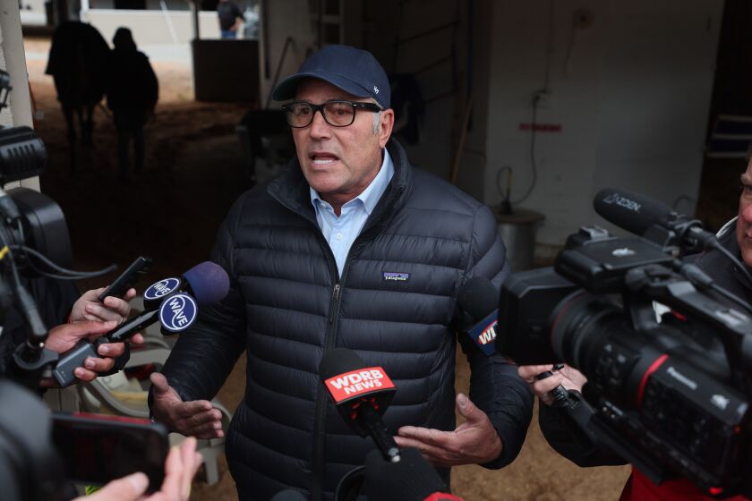LOUISVILLE, KENTUCKY - MAY 01: Tim Yakteen the trainer of Reincarnate and Practical Move talks to the media outside his barn during the morning training for the Kentucky Derby at Churchill Downs on May 01, 2023 in Louisville, Kentucky. (Photo by Andy Lyons/Getty Images)