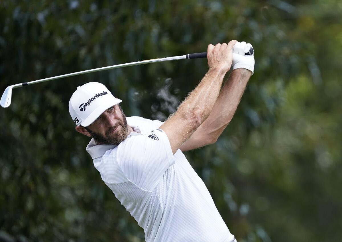 Dustin Johnson hits a tee shot on No. 3 during the second round of the Tour Championship on Sept. 5, 2020.