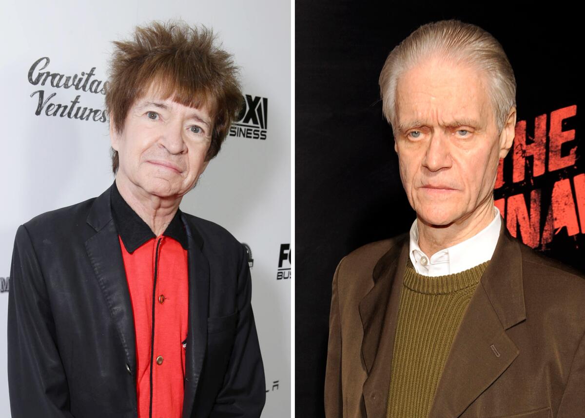 Rodney Bingenheimer, left, in a black blazer and red shirt. At right, Kim Fowley in a green sweater and brown blazer.