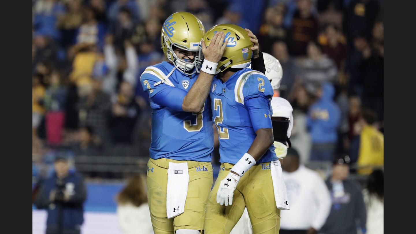 UCLA quarterback Josh Rosen hugs receiver Jordan Lasley after they hooked up on a fourth-quarter touchdown against Arizona State.