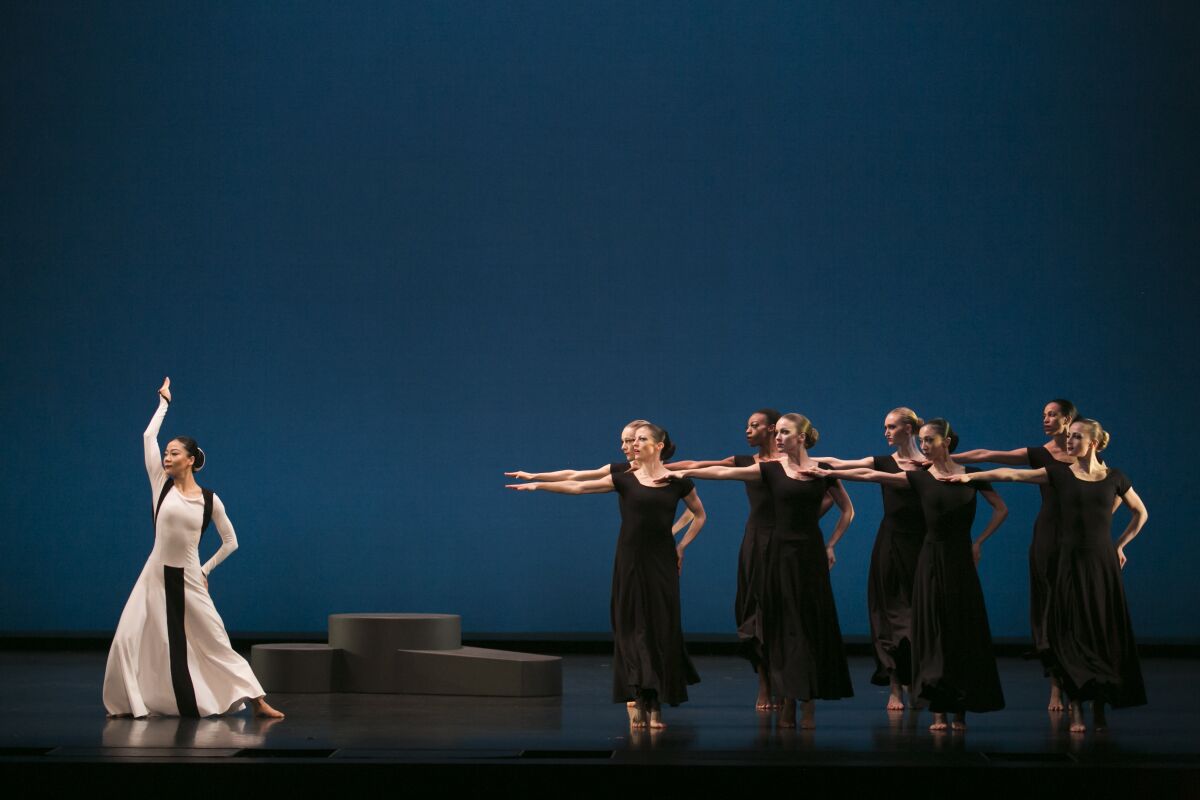 Xin Ying (left) and the Martha Graham Dance Company in "Chronicle."