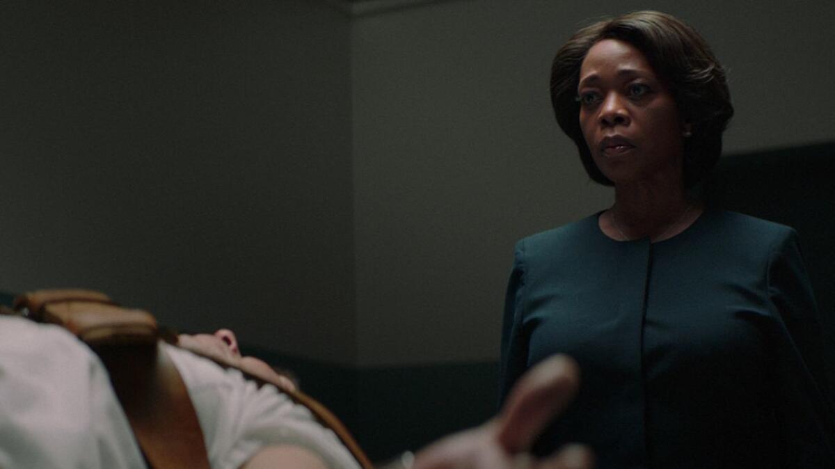 Alfre Woodard and Alex Castillo in the movie "Clemency."