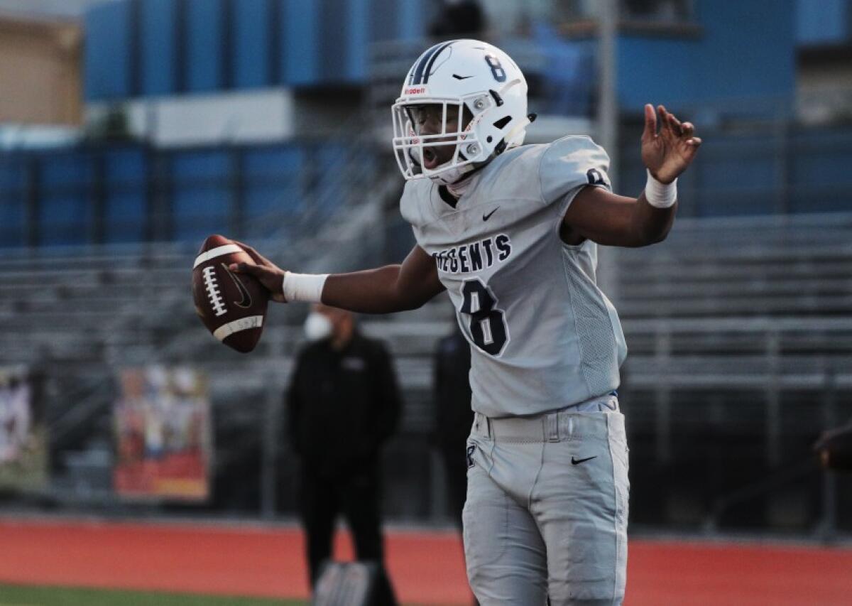 Ayomide Olabade of Reseda celebrates two-point conversion catch.