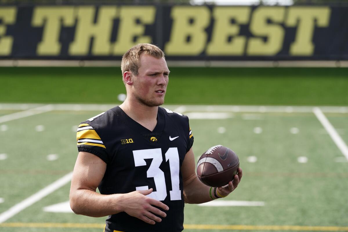 Iowa linebacker Jack Campbell looks on during a college football media day, Friday, Aug. 12, 2022, in Iowa City, Iowa. (AP Photo/Charlie Neibergall)