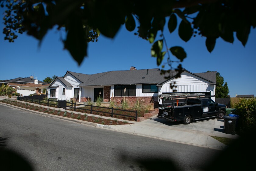 A truck is parked in the driveway of a newly renovated home in the View Park community.