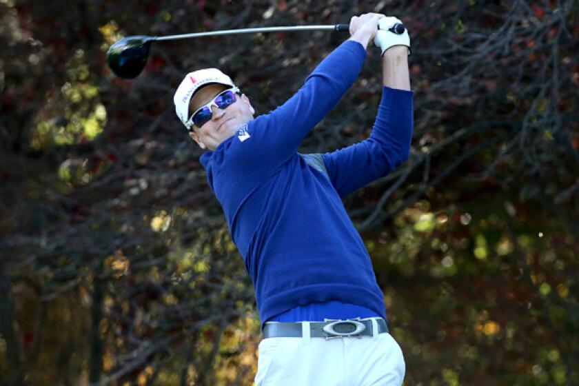 Zach Johnson hits his tee shot at No. 2 during the first round of the Northwestern Mutual World Challenge at Sherwood Country Club on Thursday.