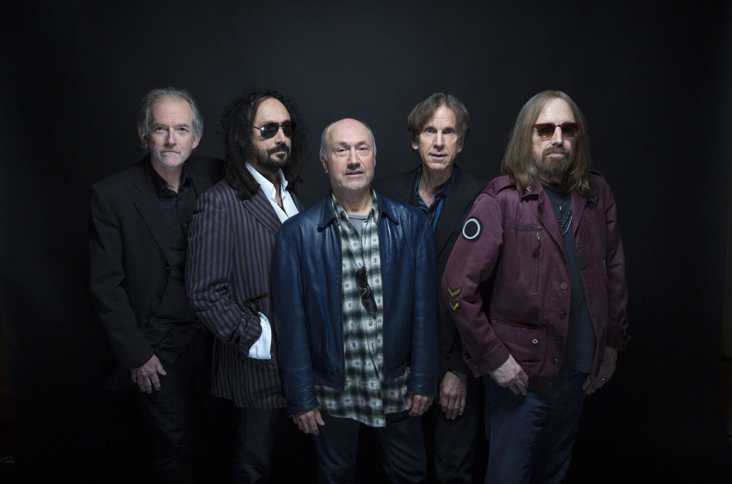 Members of Mudcrutch, from left, Benmont Tench, Mike Campbell, Randall Marsh, Tom Leadon and Tom Petty at Warner Bros. Records in Burbank on April 7, 2016.