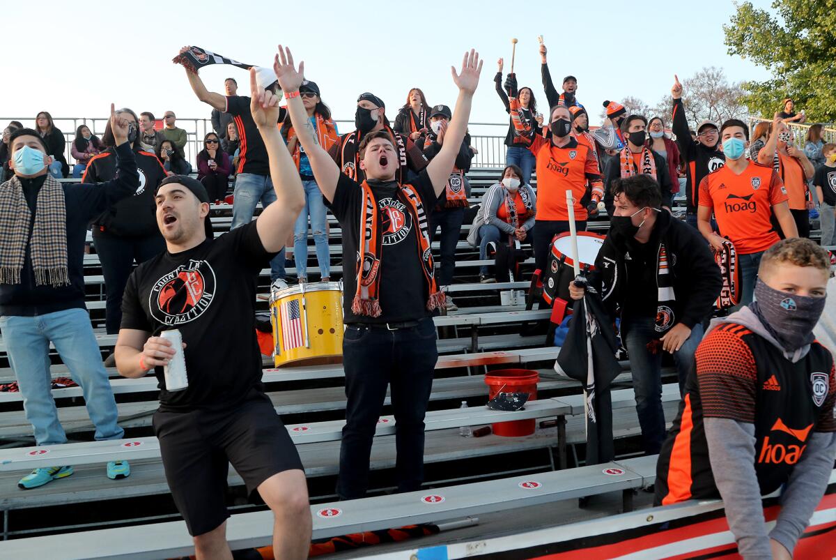 Fans cheer for the Orange County Soccer Club players as they play against Sacramento Republic FC on Saturday.