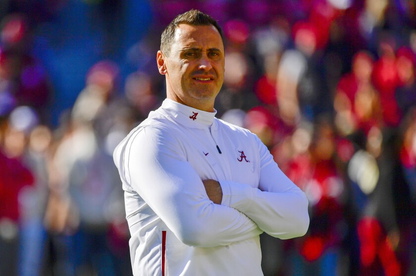 FILE - In this Nov. 9, 2019, file photo, Alabama offensive Coordinator Steve Sarkisian watches warm-ups before an NCAA football game against LSU in Tuscaloosa, Ala. Sarkisian took over as Texas’ head coach after spending the 2020 season as the offensive coordinator for national champion Alabama. (AP Photo/Vasha Hunt, File)