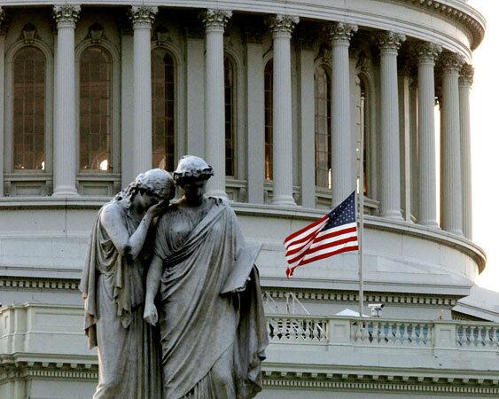 The flag flies at half-staff at the U.S. Capitol building in Washington in memory of Sen. Edward M. Kennedy.