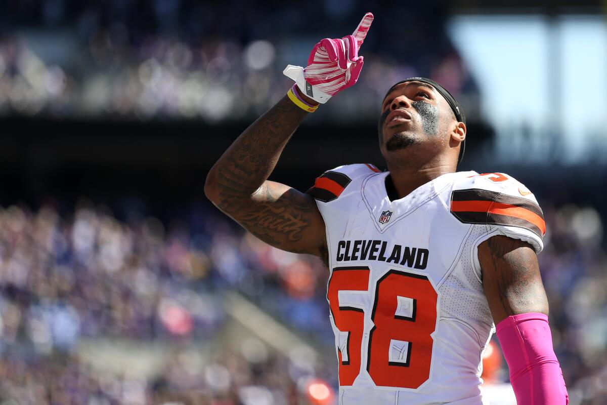 Cleveland Browns linebacker Chris Kirksey gestures before the start of a game against the Baltimore Ravens at M&T Bank Stadium.