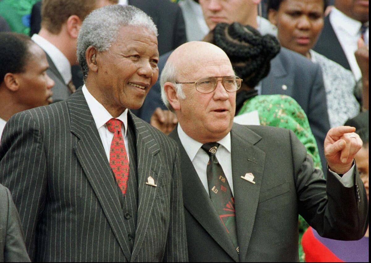Then-South African President Nelson Mandela and then-Deputy President F.W. de Klerk