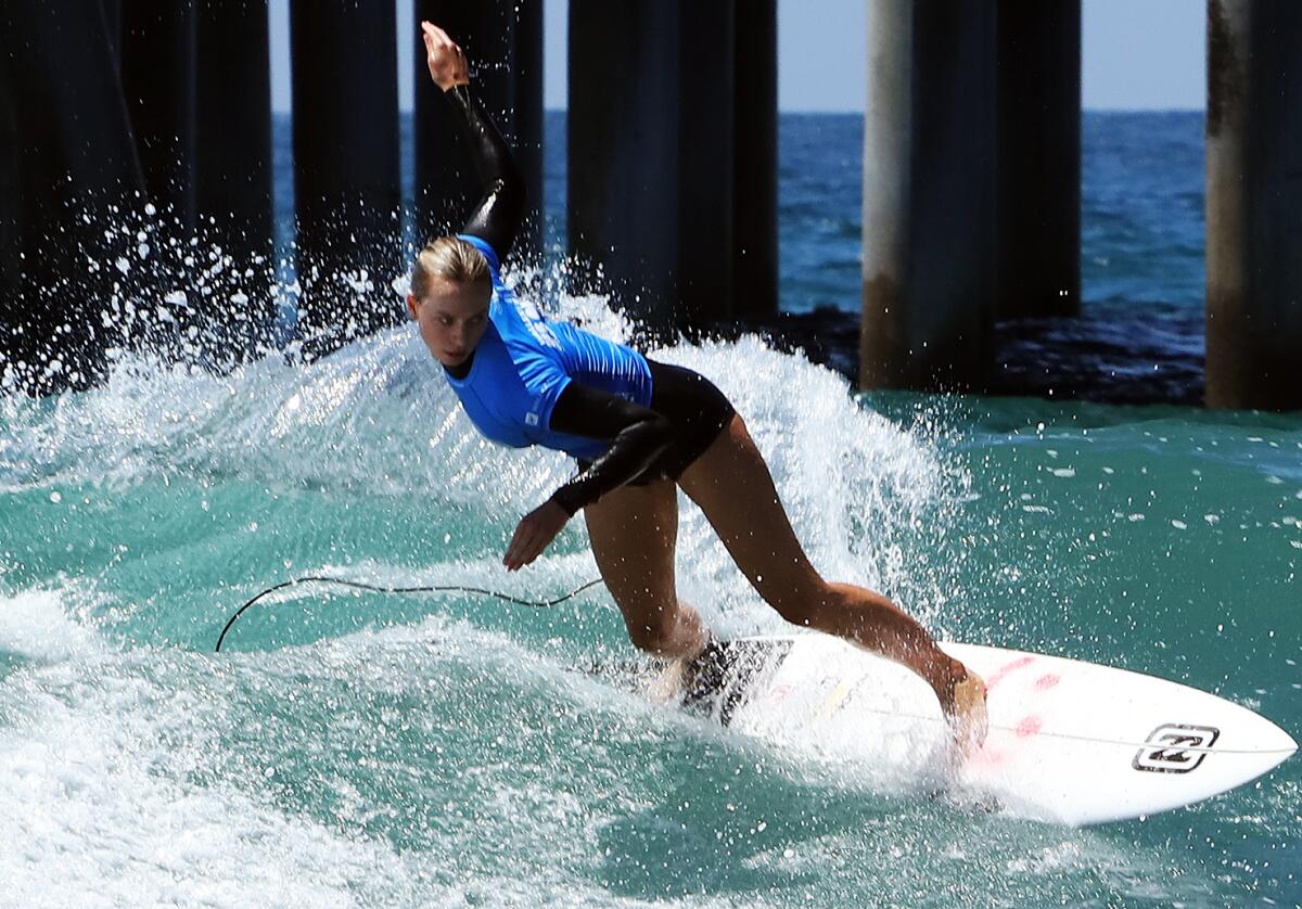 Macy Callaghan of Australia cuts back on a wave during the U.S. Open of Surfing on Friday.
