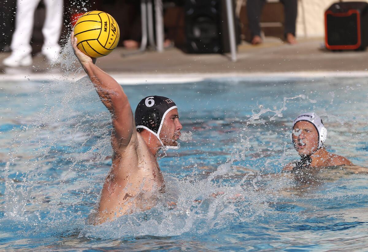 Logan Garwick (6) shoots and scores on a penalty shot for Huntington Beach during Wednesday's match.