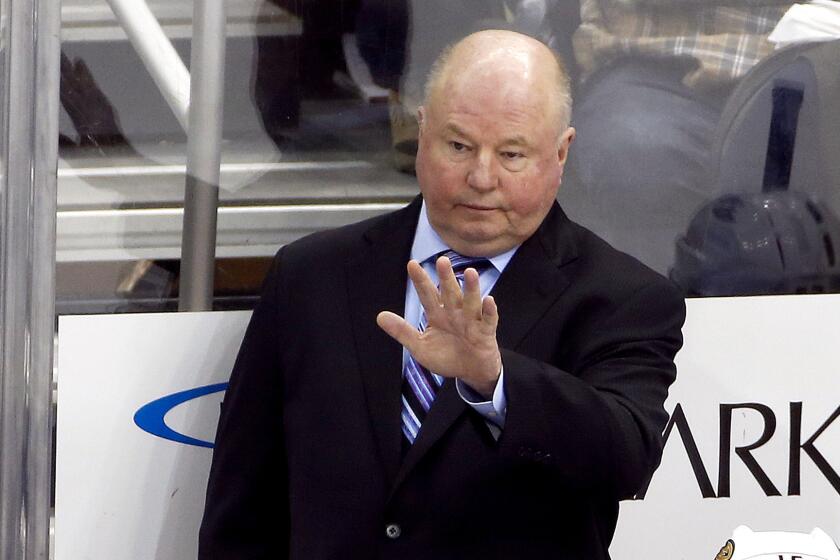 Bruce Boudreau gives some directions to the Ducks during a game this season in Pittsburgh.