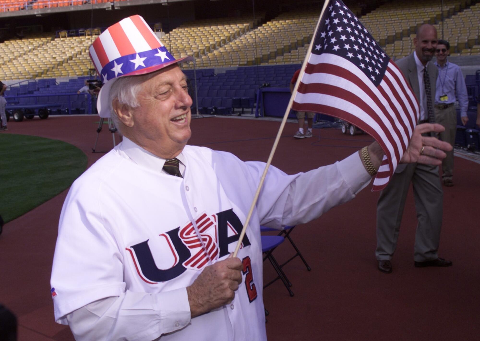 Tom Lasorda shows his patriotic side after being named manager of the 2000 U.S. Olympic baseball team.